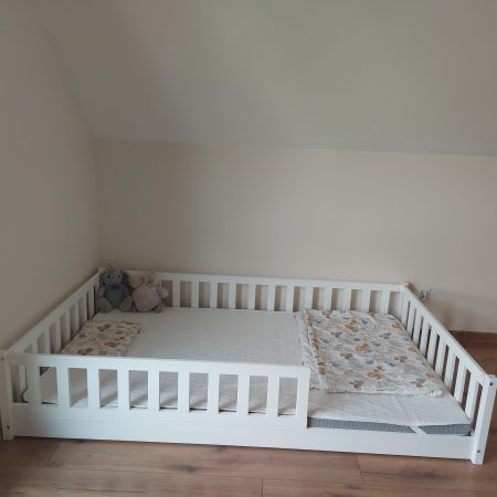 Aranżacja łóżeczka dla dziecka typu domek.