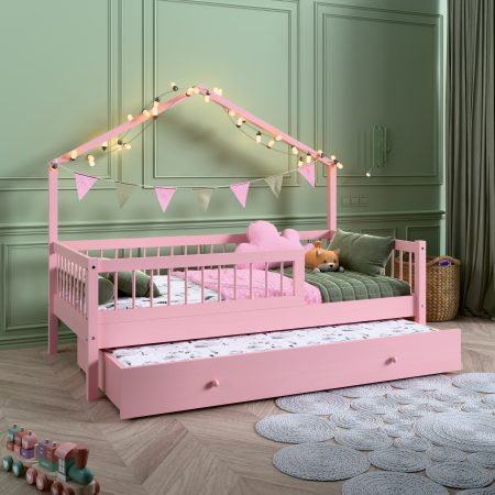 Łóżko domek dla dwulatka, trzylatka i czterolatka z barierkami. Łóżeczko domek dla chłopca i dziewczynki, różowe z szufladą do spania.